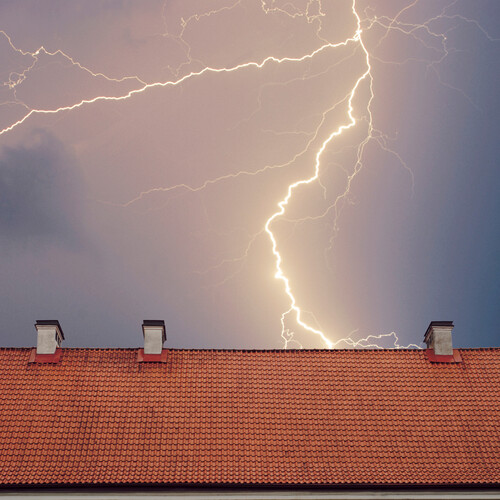 lightning striking a roof